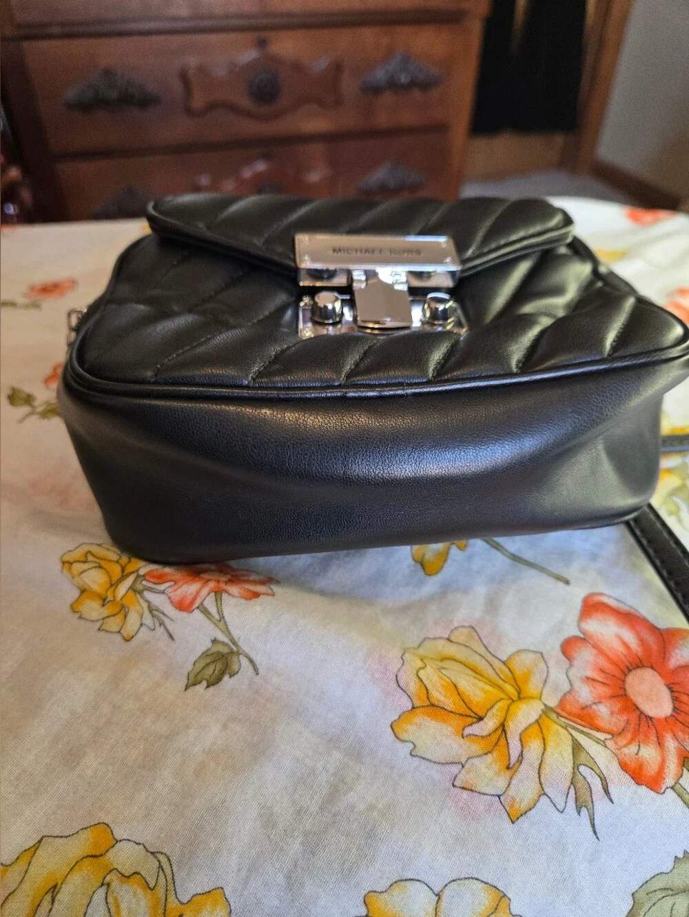 MICHAEL KORS Black Quilted Leather Crossbody with Silver Lock Closure